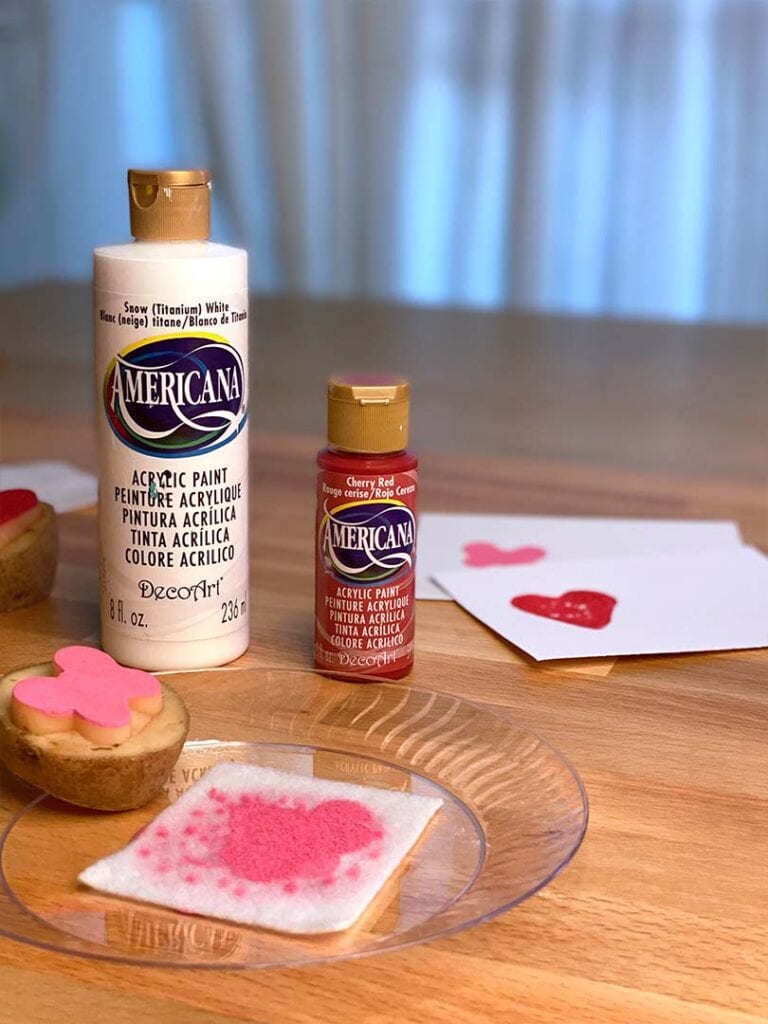 DIY Felt Stamp Pad surrounded by paint, art, and stamps