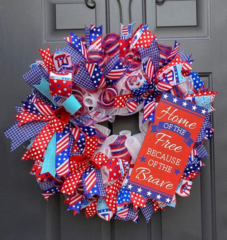 Patriotic Wreath in red white and blue with small flags, made from Brown Custom Creations wreath kit