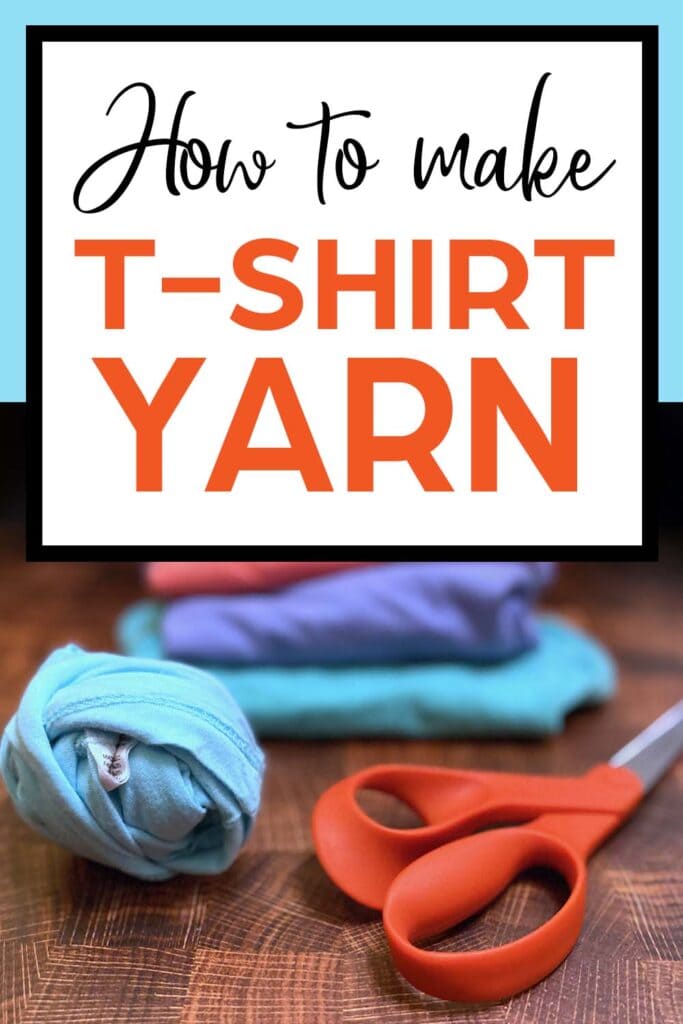 a ball of t shirt yarn sits on a wooden surface next to some orange handled fabric scissors and a stack of shirts. the text reads "how to make t-shirt yarn"