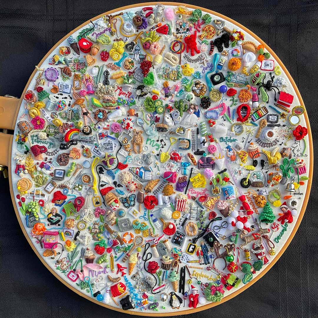 365 days meticulously stitched into an embroidery journal. many stitches are 3 dimensional and have moving parts